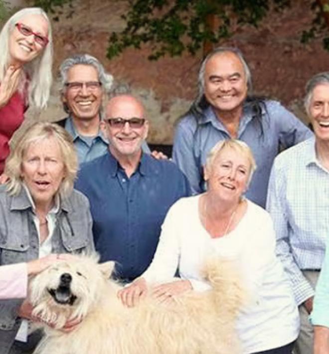 founders together in canyon with white dog