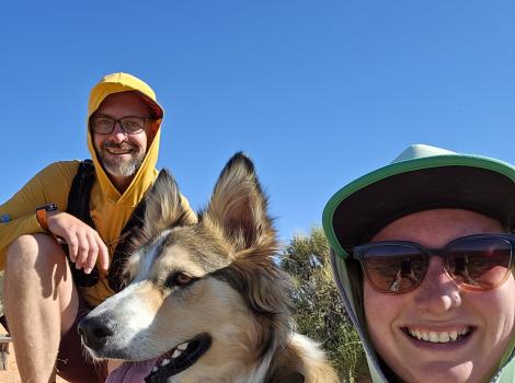 Kieran Corrigan with another person and a dog