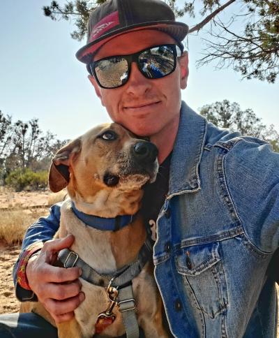 Pete O’Dea outside with a dog