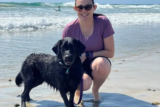 Photo of Kristen Slattery with black dog